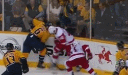Shea Weber slams Henrik Zetterberg into the glass. Shea Weber slams Henrik Zetterberg into the glass.